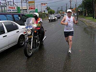 Ketan doing his roadwork with the World Harmony Run, on the island of Jamaica, 2005
